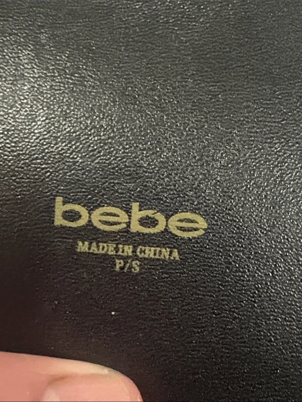 bebe Vintage belt with a crystal detail at the front.
